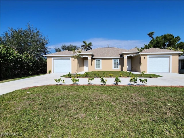 ranch-style house featuring a front lawn and a garage