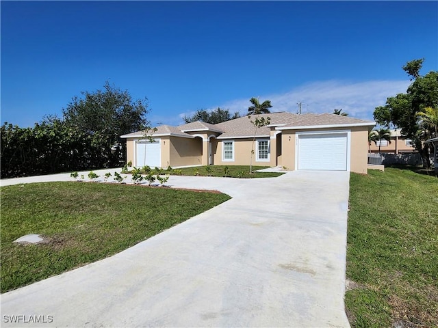 ranch-style house featuring a front lawn and a garage