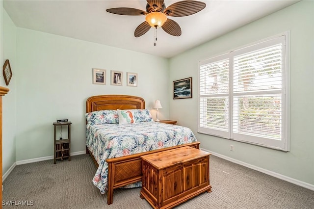 bedroom with light colored carpet and ceiling fan