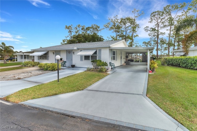 ranch-style house with a front lawn and a carport