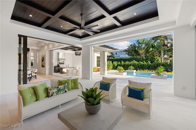 view of patio with an outdoor hangout area, ceiling fan, and an outdoor kitchen