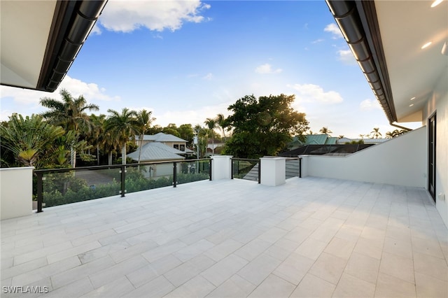 view of patio / terrace with a balcony