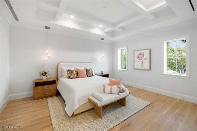 bedroom with multiple windows, light hardwood / wood-style flooring, and coffered ceiling