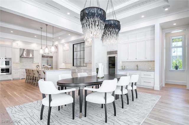 460 2nd Ave N, Naples, FL 34102 - dining area featuring a chandelier, ornamental molding, beverage cooler, light wood-type flooring, and recessed lighting