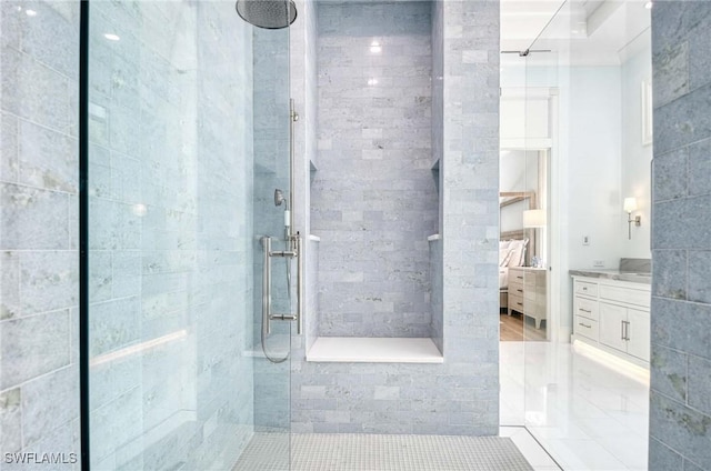 460 2nd Ave N, Naples, FL 34102 - bathroom with a stall shower, vanity, and ensuite bath