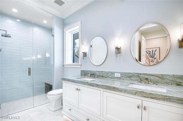 460 2nd Ave N, Naples, FL 34102 - bathroom with a stall shower, double vanity, toilet, and recessed lighting