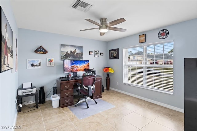 home office with light tile patterned flooring and ceiling fan