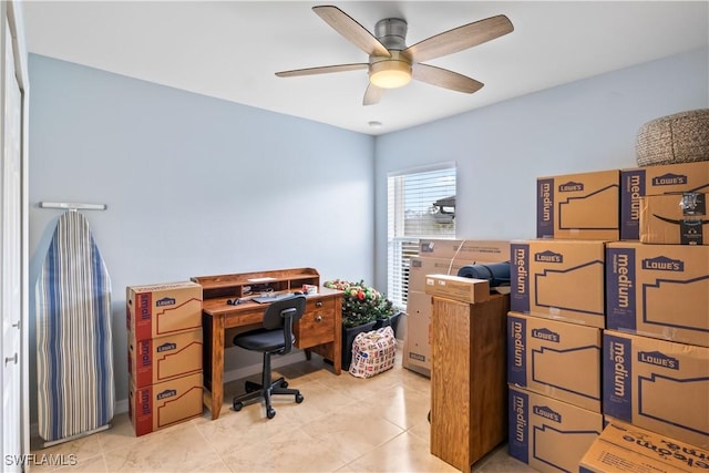 office with light tile patterned floors and ceiling fan