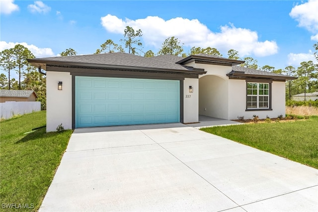 337 Woodburn Dr, Lehigh Acres, FL 33972 - view of front of house featuring stucco siding, concrete driveway, and a front yard