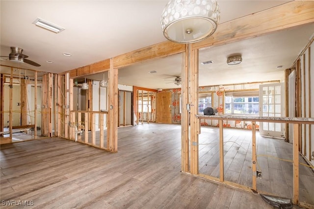 interior space featuring ceiling fan and hardwood / wood-style floors