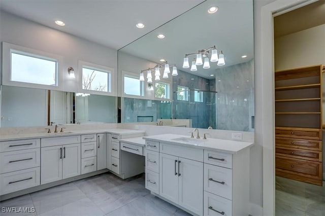 bathroom featuring vanity and walk in shower