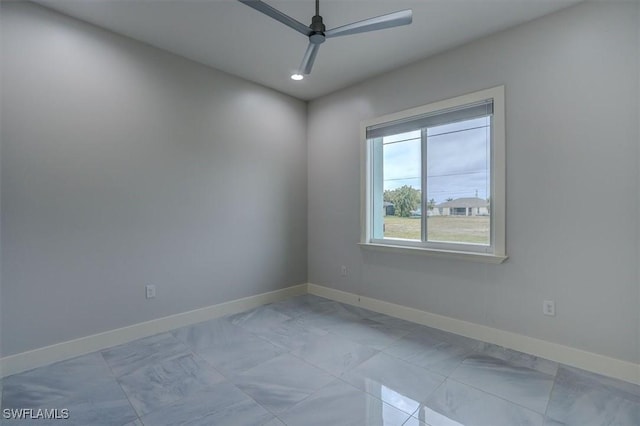 unfurnished room with ceiling fan