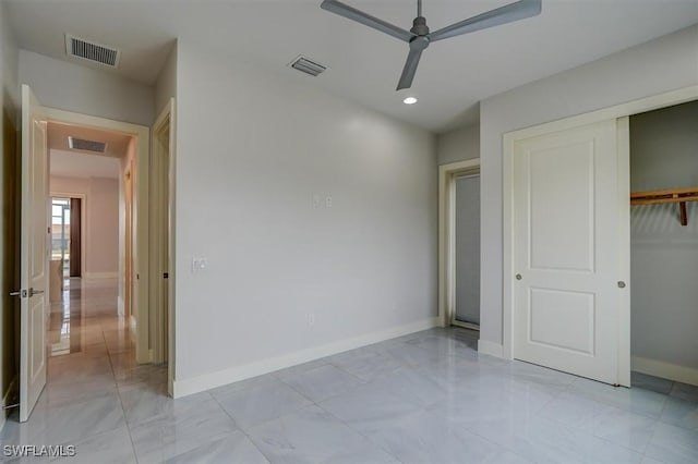 unfurnished bedroom featuring a closet and ceiling fan