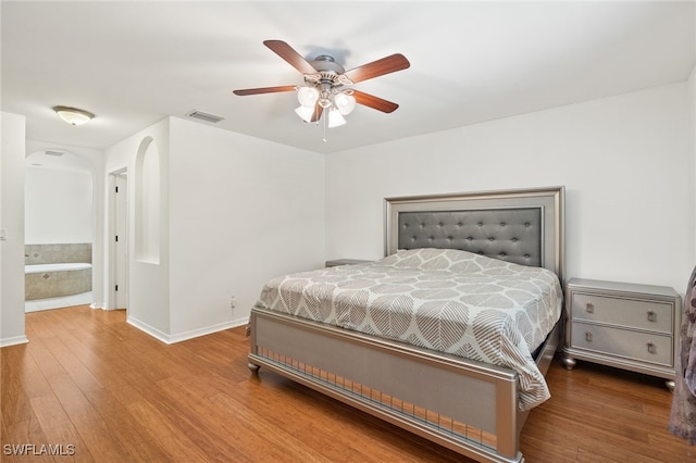 bedroom featuring ceiling fan and hardwood / wood-style flooring