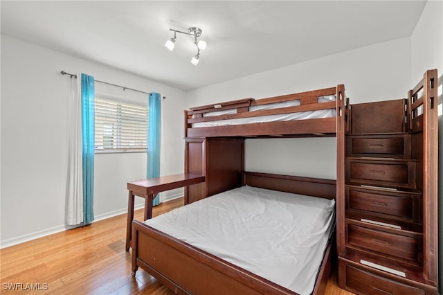 bedroom featuring light wood-type flooring