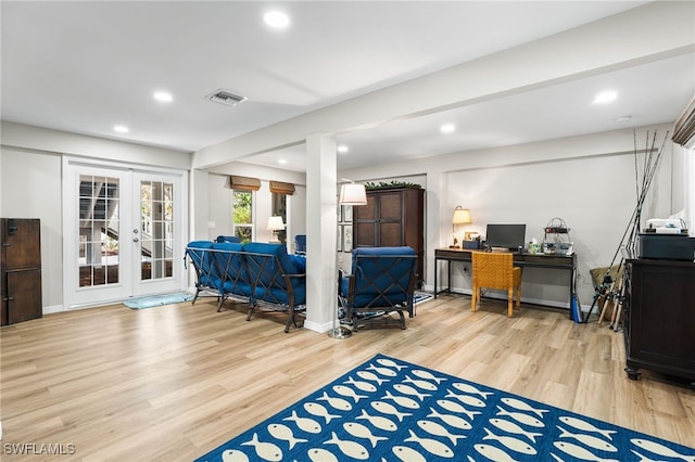 interior space with french doors and light hardwood / wood-style flooring