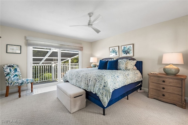 carpeted bedroom with ceiling fan and access to exterior