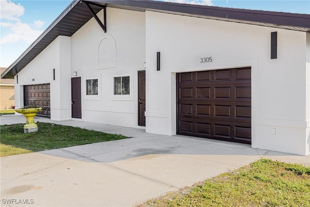 exterior space with a garage