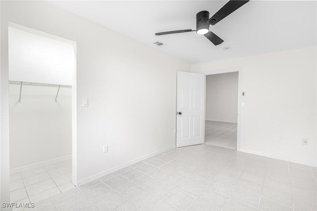 spare room with ceiling fan