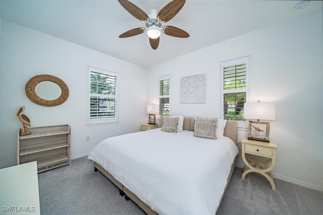 bedroom featuring ceiling fan and carpet floors