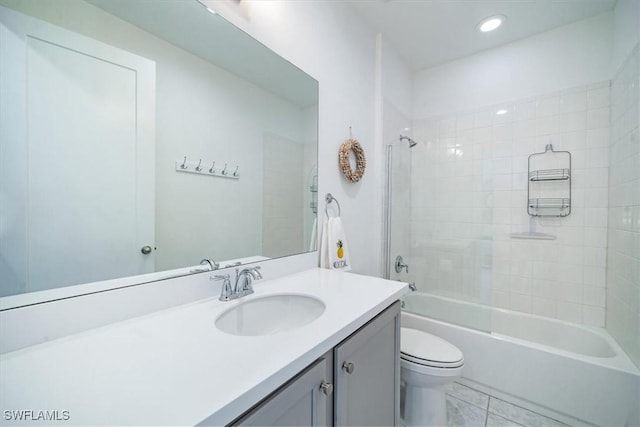 full bathroom with shower / bathing tub combination, vanity, toilet, and tile patterned flooring