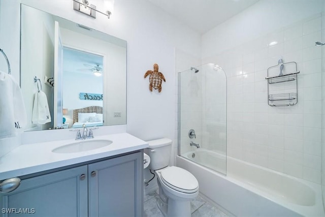 full bathroom featuring toilet, washtub / shower combination, and vanity