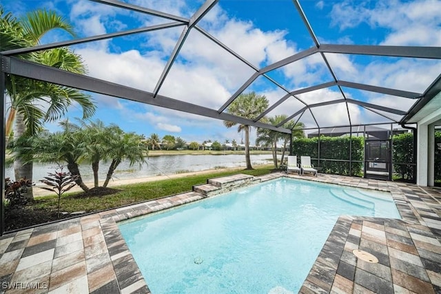 view of pool featuring a lanai, a patio area, and a water view