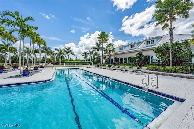 view of swimming pool featuring a patio