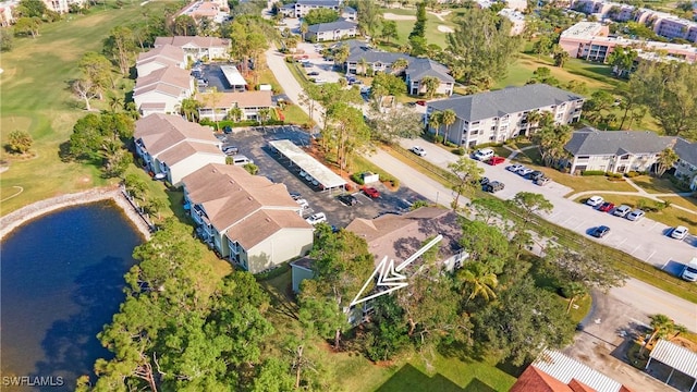 bird's eye view with a water view