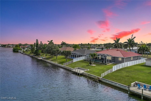 property view of water with a dock