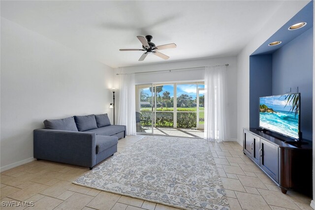 living room with ceiling fan