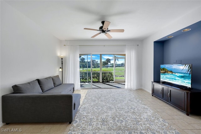 living room featuring ceiling fan