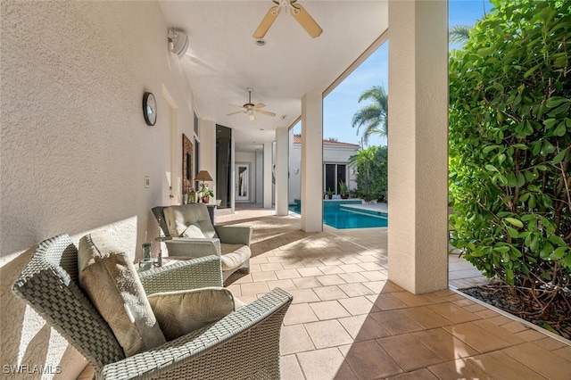 view of patio with ceiling fan