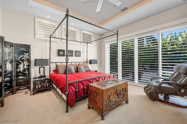 carpeted bedroom featuring ceiling fan and access to outside