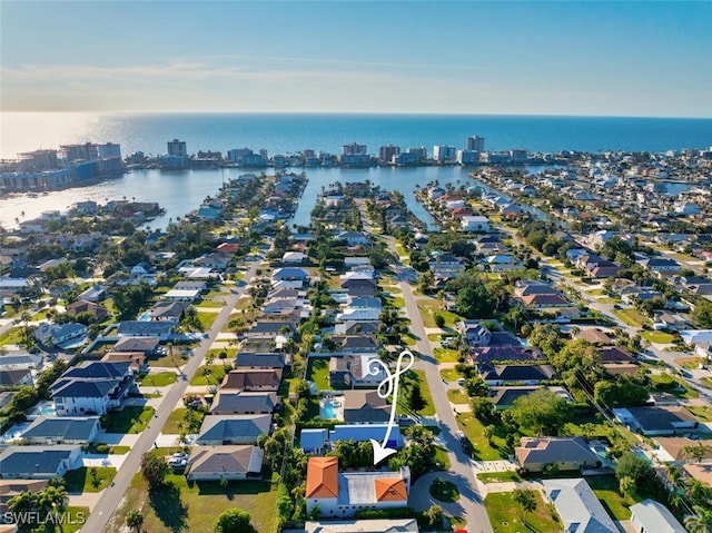 drone / aerial view featuring a water view