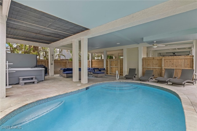 view of swimming pool with an outdoor living space, a patio, a hot tub, and ceiling fan