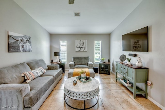 living room featuring light tile patterned floors