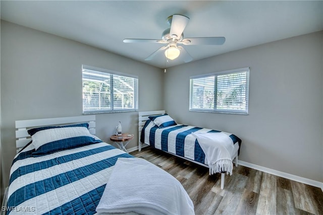 bedroom featuring ceiling fan and wood-type flooring