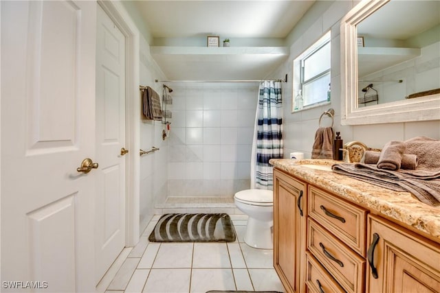 bathroom with tile patterned floors, vanity, toilet, and a shower with shower curtain