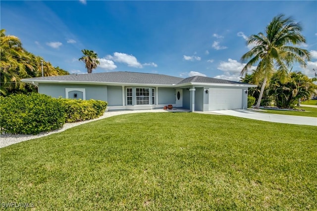 single story home with a front yard and a garage