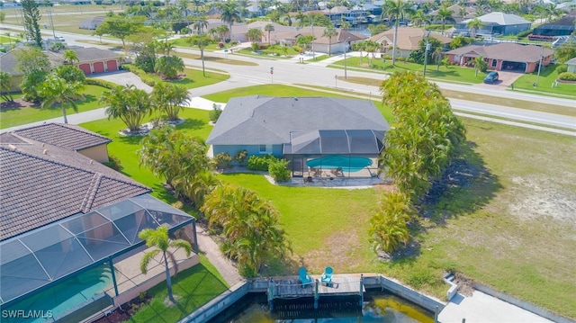 4142 SW 22nd Ct, Cape Coral, FL 33914 - aerial perspective of suburban area featuring a pool