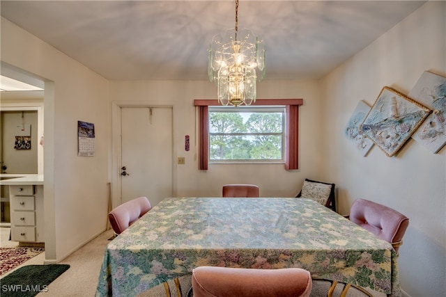 dining area featuring light carpet