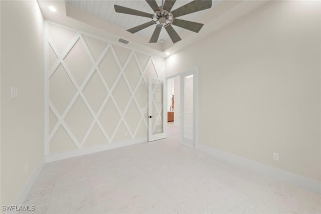 spare room with ceiling fan