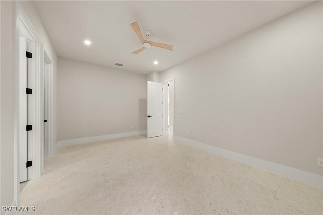 unfurnished room featuring ceiling fan