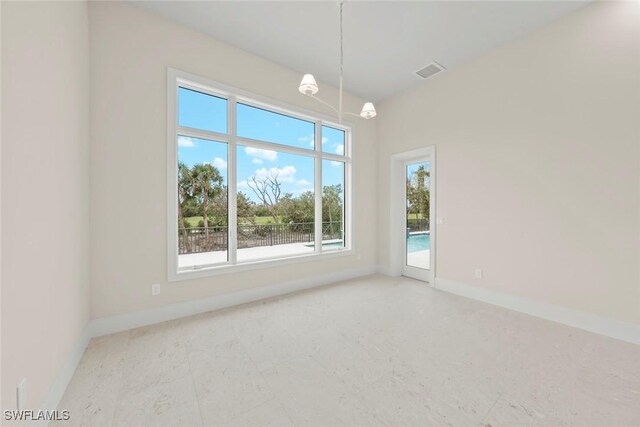 unfurnished room with a wealth of natural light