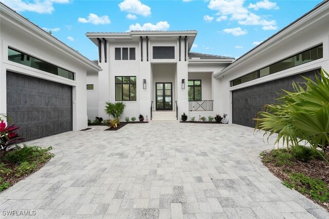 view of front of property with a garage