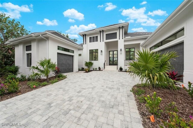 view of front of property with a garage