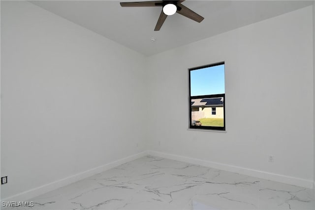 empty room featuring ceiling fan