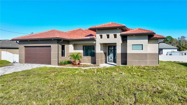 view of front facade with a front lawn and a garage