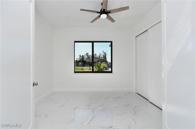 spare room featuring ceiling fan